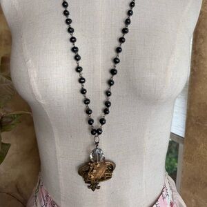 Glossy Black Beaded Necklace with Silver-Toned Accents